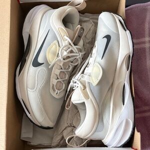 Nike Spark Cream and Black athletic shoes. Size 8